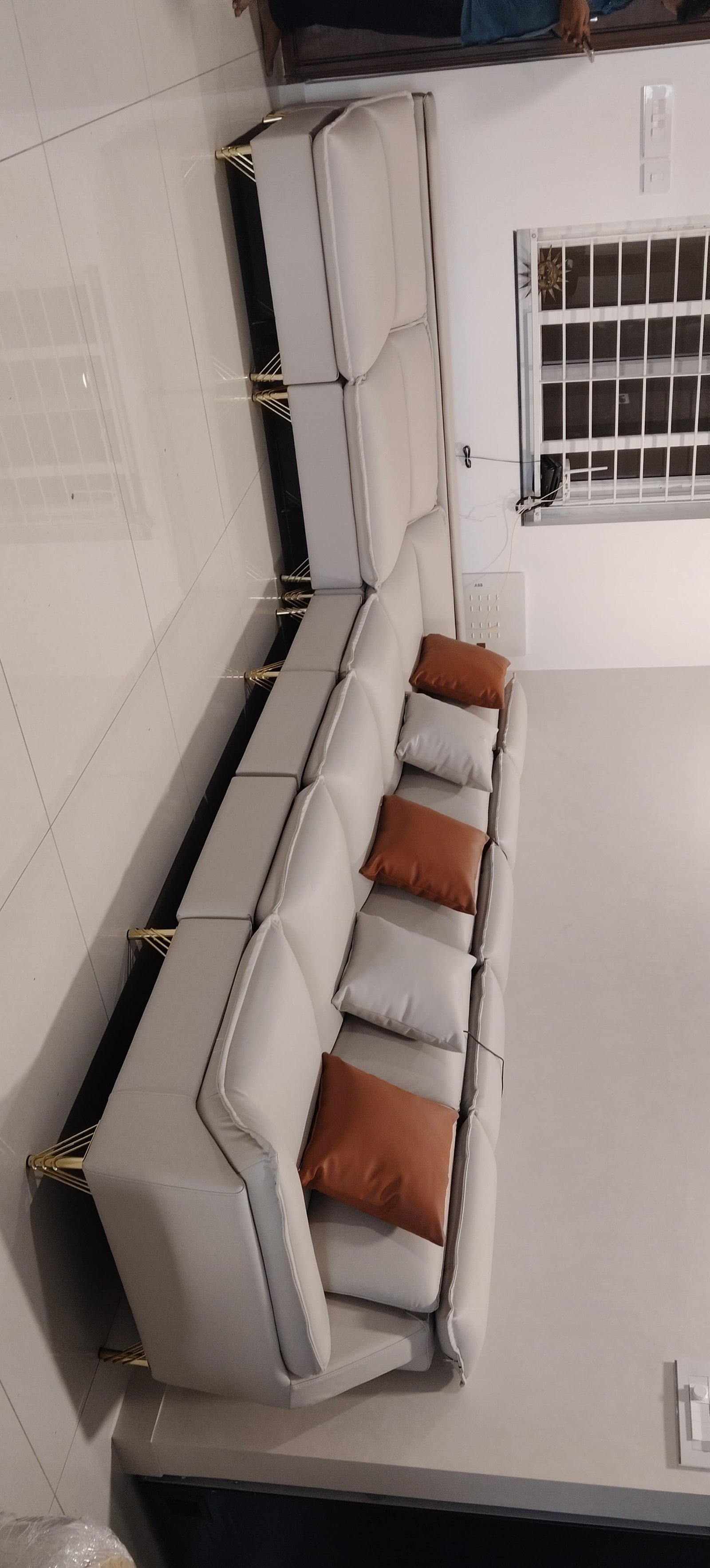 Green fabric L-shaped corner sofa